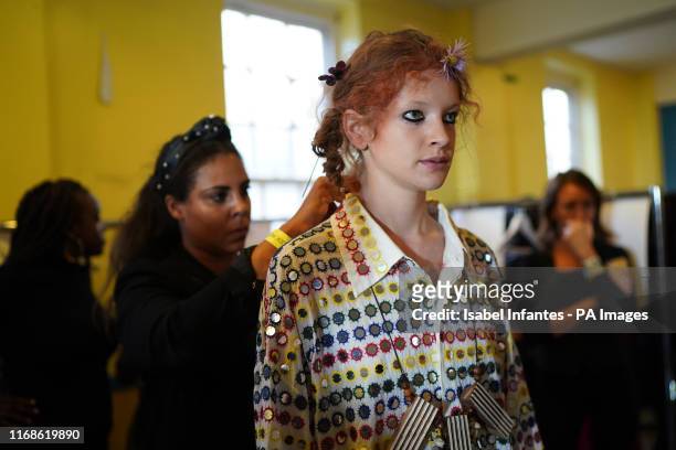 Models on the backstage at the Ashish Spring/Summer 2020 London Fashion Week outside the Seymour Hall in London.