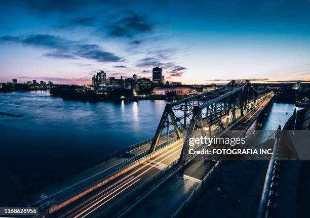 hull bridge on ottawa river (dusk) - gatineau stock pictures, royalty-free photos & images