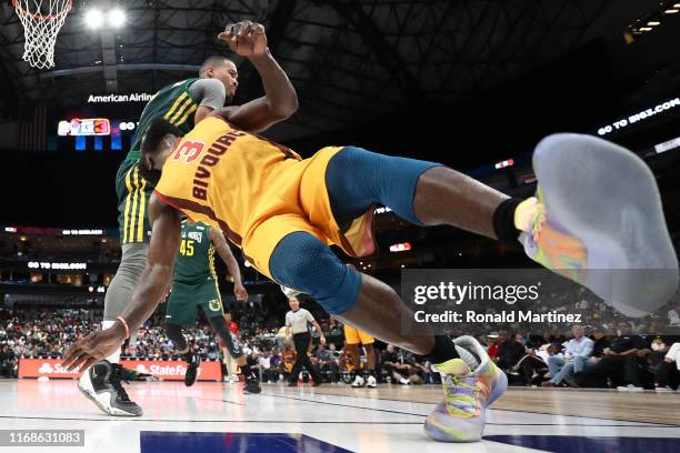 Will Bynum of the Bivouac falls as he has his shot blocked by Mustapha Farrakhan of the Ball Hogs during week nine of the BIG3 three on three...