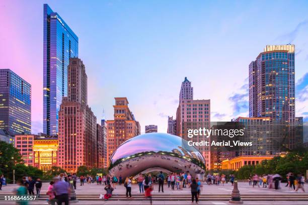 cloud gate at dusk - "the bean" - chicago bean stock pictures, royalty-free photos & images