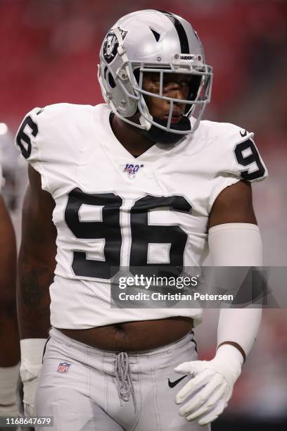 Defensive end Clelin Ferrell of the Oakland Raiders warms up before the NFL preseason game against the Arizona Cardinals at State Farm Stadium on...