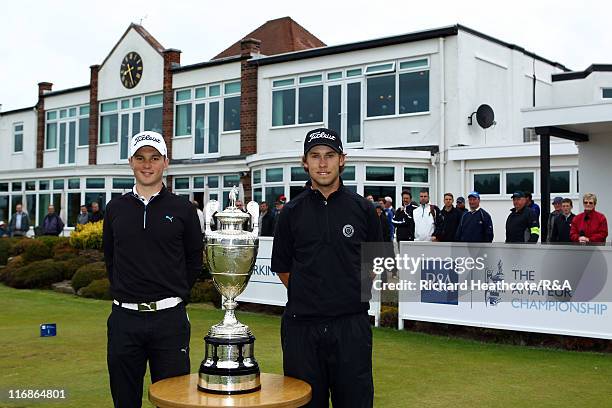 Michael Stewart of Scotland and Bryden Macpherson of Australia pose with the trophy before they tee off in the Final of The Amateur Championship 2011...