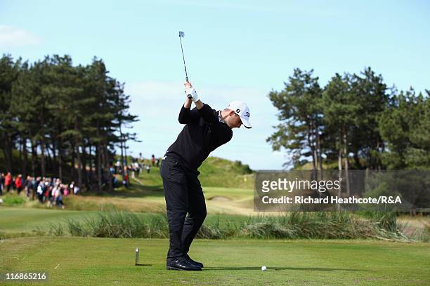 Michael Stewart of Scotland tee's off at the 10th during the Final of The Amateur Championship 2011 at Hillside Golf Club on June 18, 2011 in...