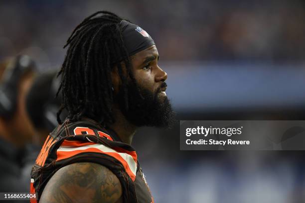 Sheldon Richardson of the Cleveland Browns watches action during a preseason game against the Indianapolis Colts at Lucas Oil Stadium on August 17,...