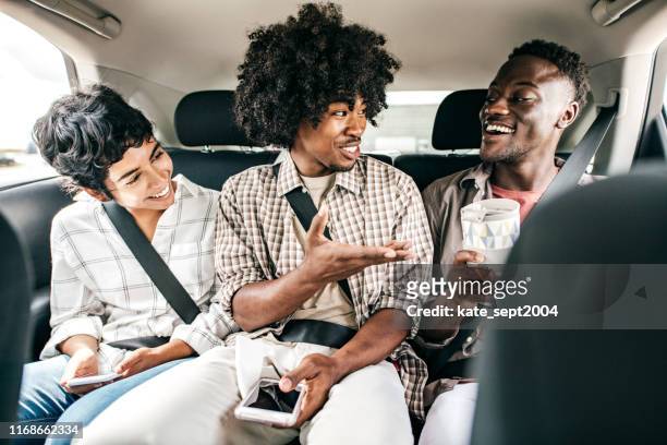 meeting new friends while sharing a ride - car sharing stock pictures, royalty-free photos & images