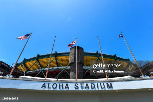 The wind blows flags fronting Aloha Stadium before the preseason game between the Dallas Cowboys and the Los Angeles Rams at Aloha Stadium on August...