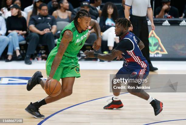 Brandon Rush of the Aliens dribbles against Nate Robinson of the Tri State during week nine of the BIG3 three on three basketball league at American...