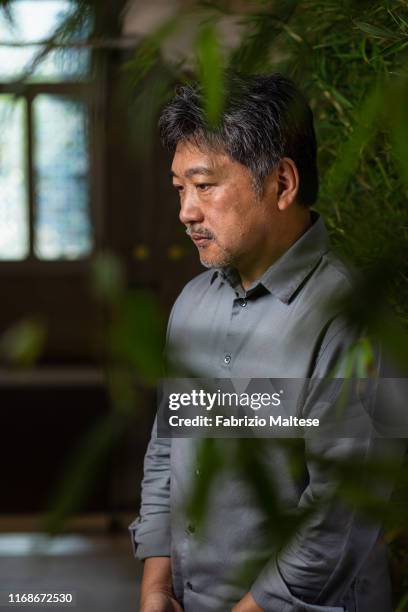 Filmmaker Hirokazu Kore-eda poses for a portrait on August 28, 2019 in Venice, Italy.