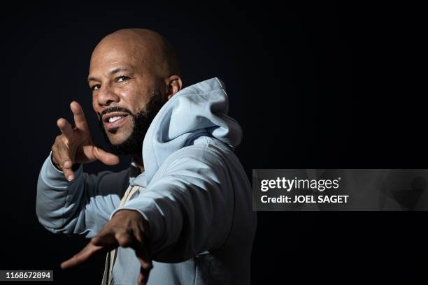 American rapper, actor, writer and activist Lonnie Corant Jaman Shuka Rashid Lynn better known by his stage name Common poses during a photo session...