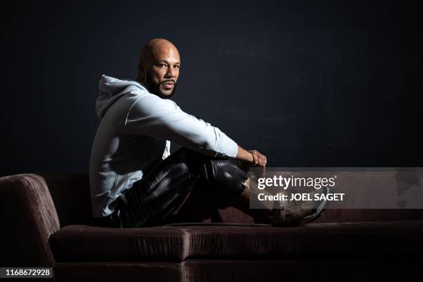 American rapper, actor, writer and activist Lonnie Corant Jaman Shuka Rashid Lynn better known by his stage name Common poses during a photo session...