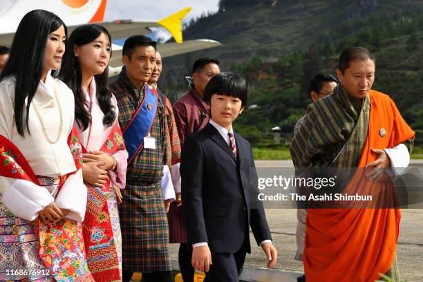 Prince Hisahito of Japan are welcomed by Princess Dechen Yangzom Wangchuck of Bhutan and Princess Euephelma Choden Wangchuck of Bhutan on arrival at...