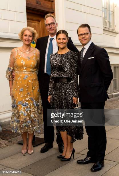Crown Princess Victoria and Prince Daniel of Sweden pose at their arrival together with the Swedish Ambassador Frederik Jorgensen at his residence in...