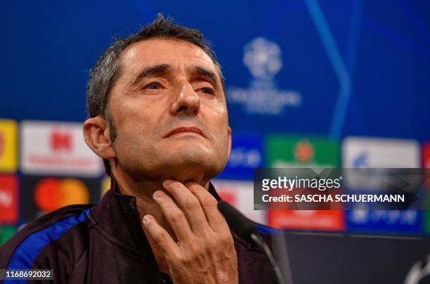 Barcelona's Spanish coach Ernesto Valverde addresses a press conference on the eve of the UEFA Champions League Group F football match between...