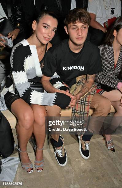 Dua Lipa and Anwar Hadid attend the Burberry September 2019 show during London Fashion Week, on September 16, 2019 in London, England.