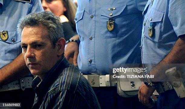 Convict Mario Alessi , who is serving a 30-year sentence for kidnapping and killing a 18-month old boy, Tommaso Onofri, sits on June 18, 2011 in...