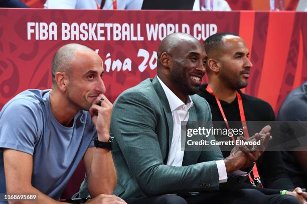 Manu Ginóbili, and Kobe Bryant are seen reacting to a play between Argentina and France game during the 2019 FIBA World Cup Semi-Finals at the...