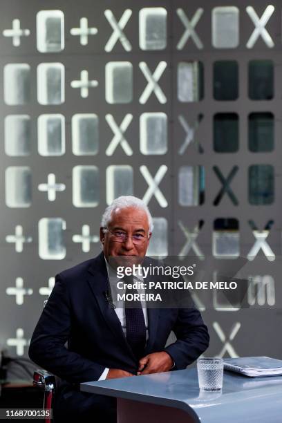 Incumbent Portuguese Prime Minister Antonio Costa of the centre-left Socialist Party gets ready prior to a televised debate with the president of the...
