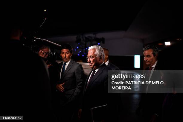 Incumbent Portuguese Prime Minister Antonio Costa of the centre-left Socialist Party arrives for a televised debate with the president of the...