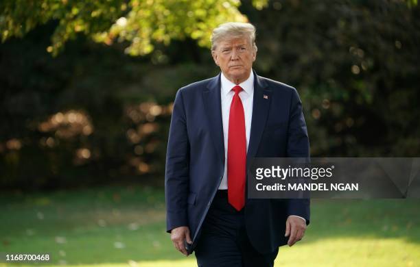 President Donald Trump comes out of the Oval Office for his departure from the White House on September 16, 2019 in Washington, DC. - President Trump...