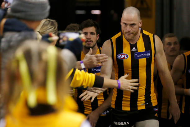 Jarryd Roughead of the Hawks runs out in his farewell game 1before the round 22 AFL match between the Hawthorn Hawks and the Gold Coast Suns at...