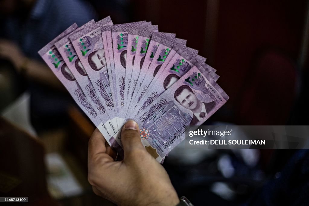 SYRIA-CONFLICT-CURRENCY-ECONOMY