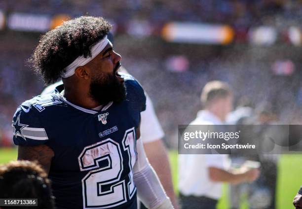 Dallas Cowboys running back Ezekiel Elliott talks on the bench during the game against the Washington Redskins on September 15 at FedEx Field in...