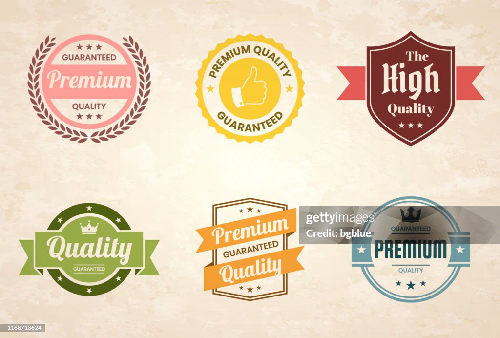 Conjunto de insignias y etiquetas vintage coloridas de "calidad" - Elementos de diseño