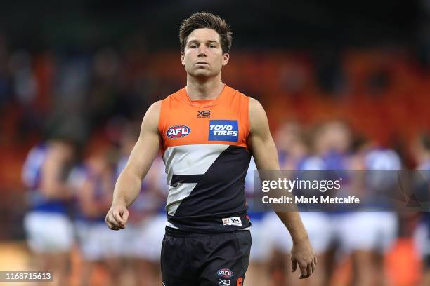 Toby Greene of the Giants looks dejected as he walks from the field after defeat in the round 22 AFL match between the Greater Western Sydney Giants...