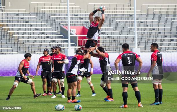 Japan's lock Wimpie van der Walt takes part in a training session at the Prince Chichibu Memorial Rugby Stadium in Tokyo on September 17 ahead of the...
