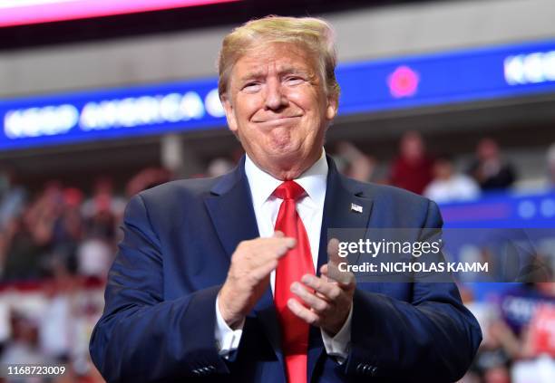 President Donald Trump claps during a campaign rally in Rio Rancho, New Mexico, on September 16, 2019.