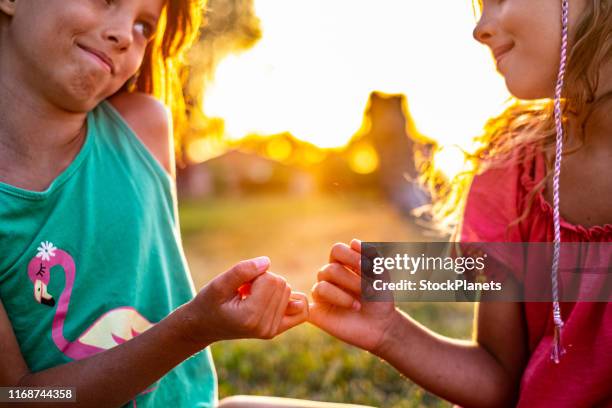sisters forgiveness - children only stock pictures, royalty-free photos & images