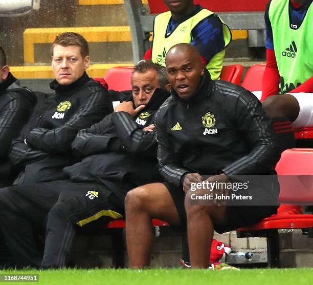 Coach Quinton Fortune of Manchester United watches from the dugout during the Premier League 2 match between Manchester United U23s and Reading U23s...