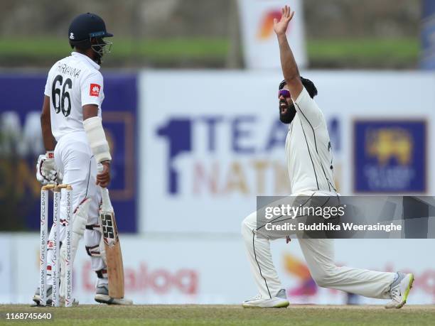 Ajaz Patel of New Zealand appeals with unsuccess for the wicket of Dimuth Karunaratne of Sri Lanka as Lahiru Thirimanne look during day five of the...