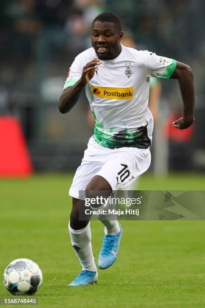 Marcus Thuram of Borussia Moenchengladbach controls the ball during the Bundesliga match between Borussia Moenchengladbach and FC Schalke 04 at...