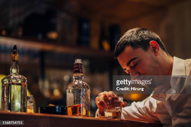Drunk Man Drinking Whiskey And Tequila High-Res Stock Photo - Getty Images