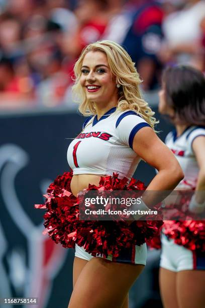 Houston Texans cheerleader looks over during the football game between the Houston Texans and Jacksonville Jaguars at NRG Stadium on September 15,...