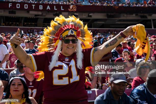 Washington Redskins fan celebrates during the first half of the game against the Dallas Cowboys at FedExField on September 15, 2019 in Landover,...