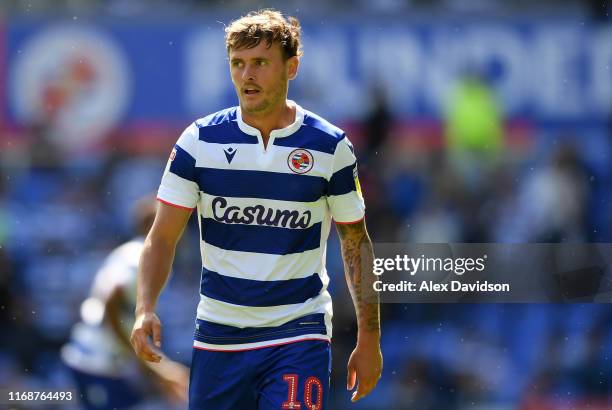 John Swift of Reading looks on during the Sky Bet Championship match between Reading and Cardiff City at Madejski Stadium on August 18, 2019 in...