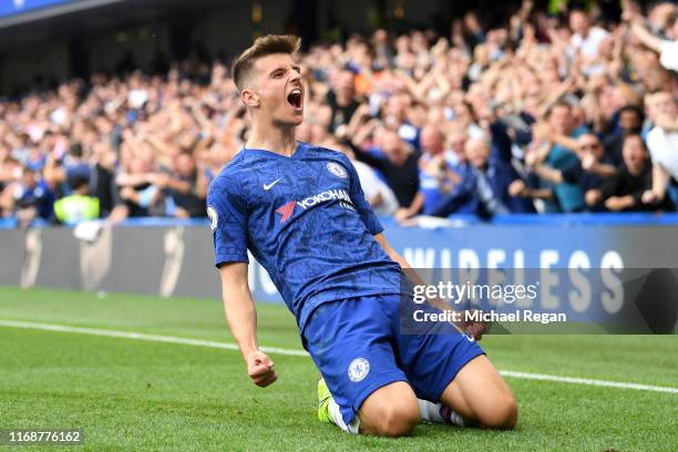 Mason Mount of Chelsea celebrates after scoring his team's first goal during the Premier League match between Chelsea FC and Leicester City at...