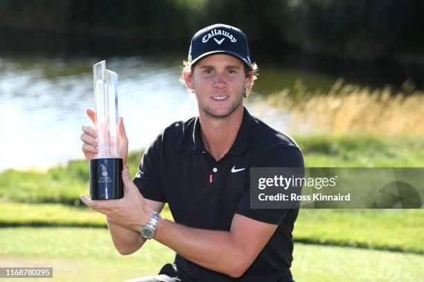 Thomas Pieters of Belgium poses with the trophy after winning the D+D Real Czech Masters during Day Four of the D+D Real Czech Masters at Albatross...