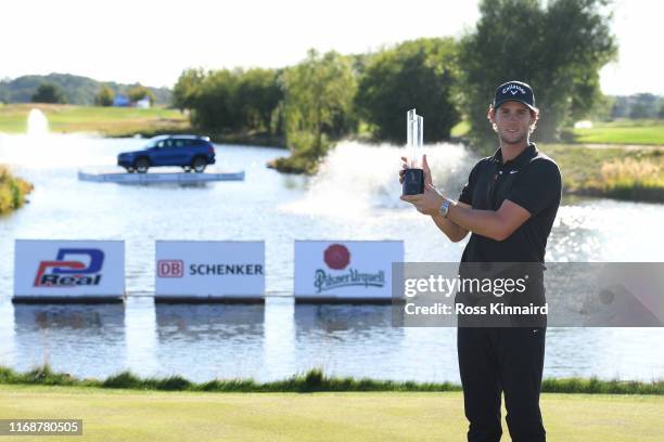 Thomas Pieters of Belgium poses with the trophy after winning the D+D Real Czech Masters during Day Four of the D+D Real Czech Masters at Albatross...