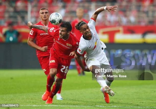 Yussuf Poulsen of RB Leipzig battles with Christopher Trimmel of 1. FC Union Berlin during the Bundesliga match between 1. FC Union Berlin and RB...