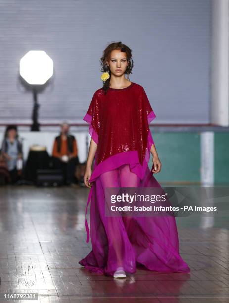 Models on the catwalk at the Ashish Spring/Summer 2020 London Fashion Week at Seymour Hall in London.