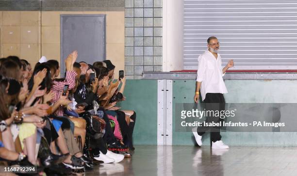 Designer Ashish acknowledges the audience following the Spring/Summer 2020 London Fashion Week at Seymour Hall in London.