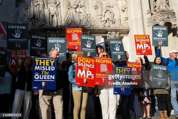 Protesters demonstrates outside UK Supreme Court in London, United Kingdom on September 17, 2019 as the court begins a three day appeal hearing in...