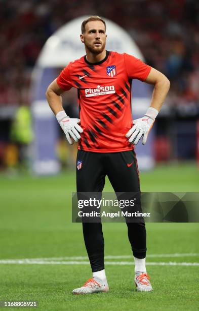 Jan Oblak of Atletico Madrid warms up prior to the Liga match between Club Atletico de Madrid and Getafe CF at Wanda Metropolitano on August 18, 2019...