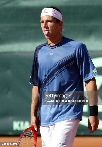 Austrian player Jurgen Melzer sticks his tongue out during a match against Belgian Oliver Rochus in the Werzer Arena of Portschach am Worthersee,...