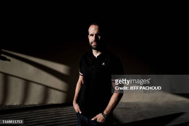 French former rugby player Frederic Michalak poses during a photo session at the Matmut stadium in Lyon on September 17, 2019. - Michalak has...