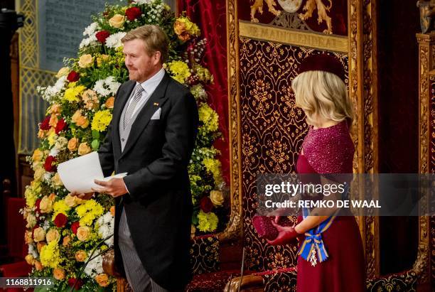 King Willem-Alexander with Queen Maxima by his side delivers his speech to members of the Upper and Lower Chamber in the Ridderzaal in The Hague, on...