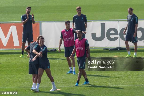 Cristiano Ronaldo and Danilo Luiz da Silva , during the training on the eve of the UEFA Champions League football match between Atletico Madrid and...